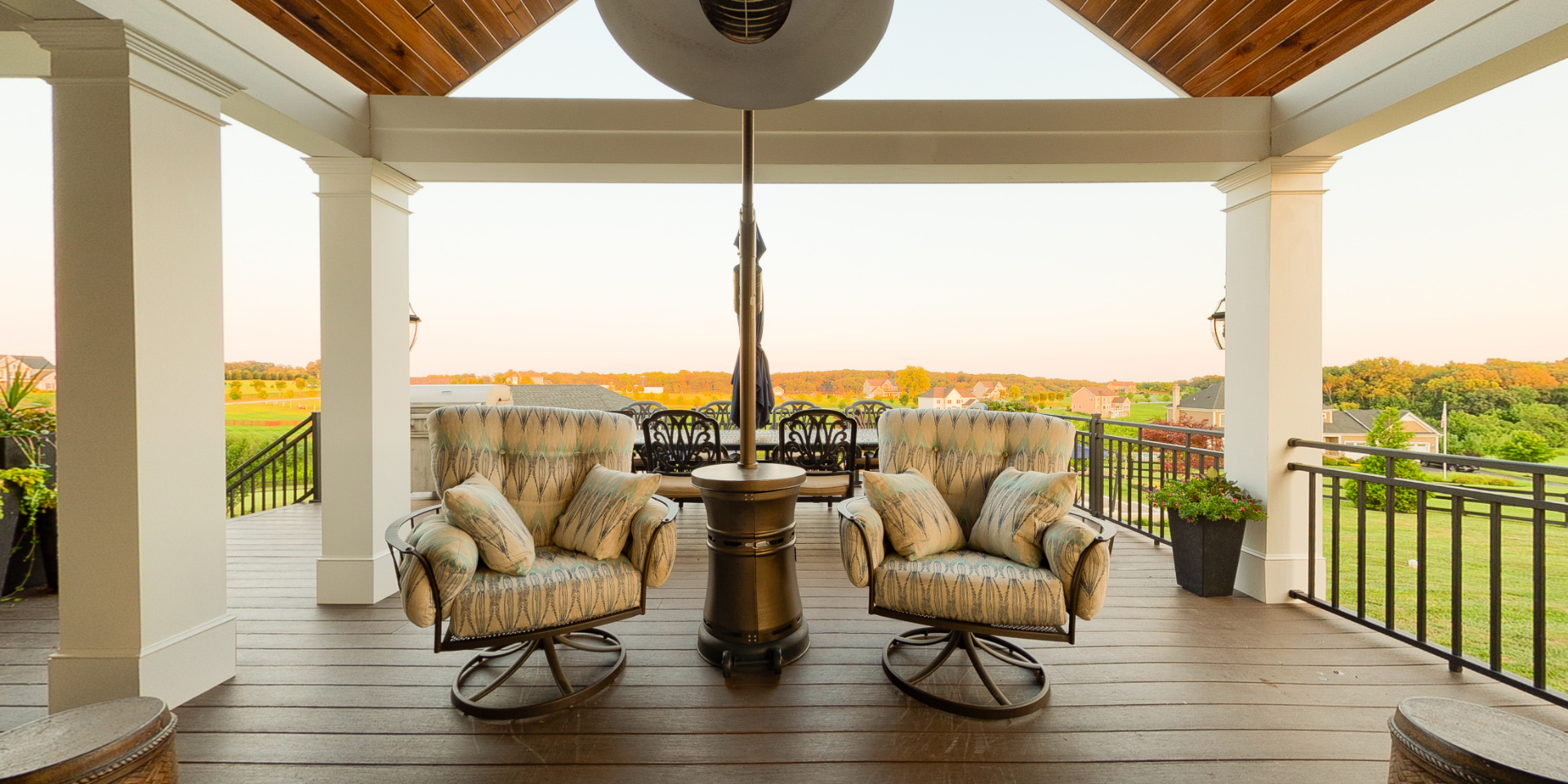 Back of Home Looking Out of Land with Two Chairs with Deck Installation in Howard County, Glenelg, Ellicott City, Sykesville, West Friendship, and Clarksville