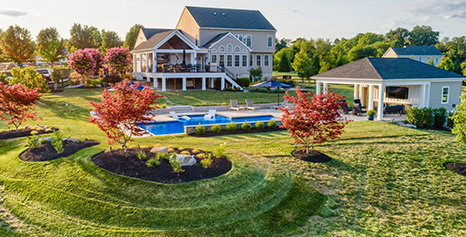 Back of House and Pool House with Pool After Landscape Installation in Marriotsville, Woodbine, Howard County, Glenelg, Sykesville, and West Friendship