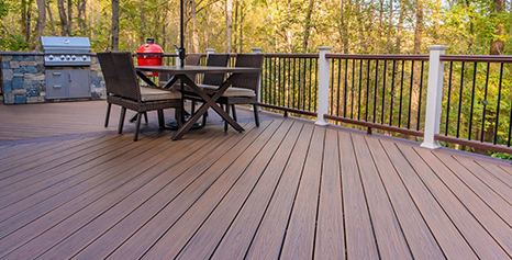 Brown Deck with Table and Grill After Deck Installation in Fulton, Highland, Marriotsville, Woodbine, Glenwood, Clarksville